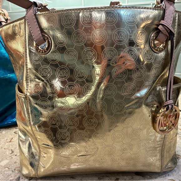 Michael Kors Handbags - Michael Kors Metallic Gold Logo Tote with Leather Trim